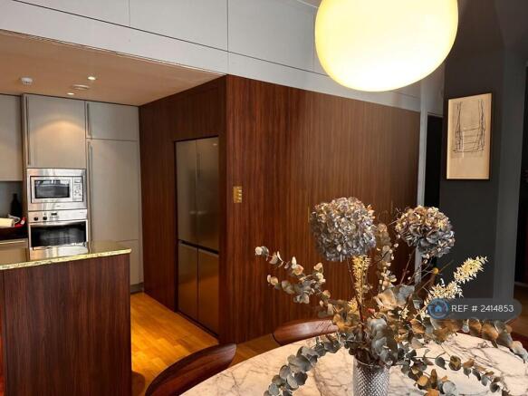 Partial View Of Kitchen And Dining Area