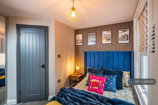 Bed And Bathroom Door