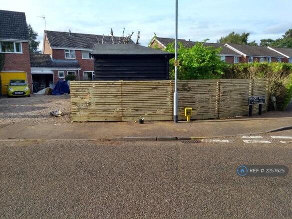 Enclosed Front Garden With Summer House 