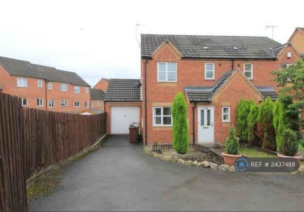 Front Showing Garage And Driveway
