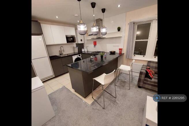 The Kitchen With Breakfast Bar