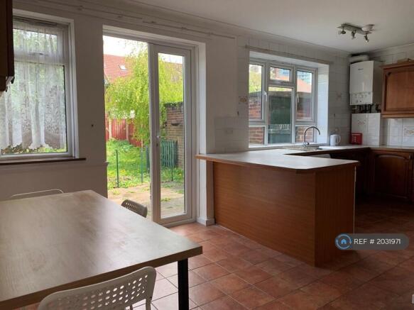 Open Plan Kitchen Diner To Garden