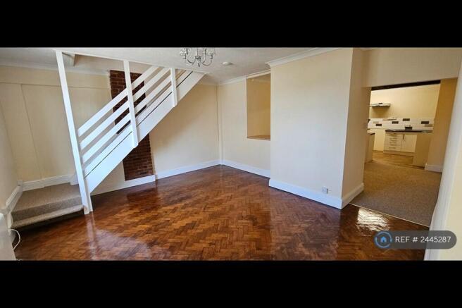 Lounge With Access To Dining Room