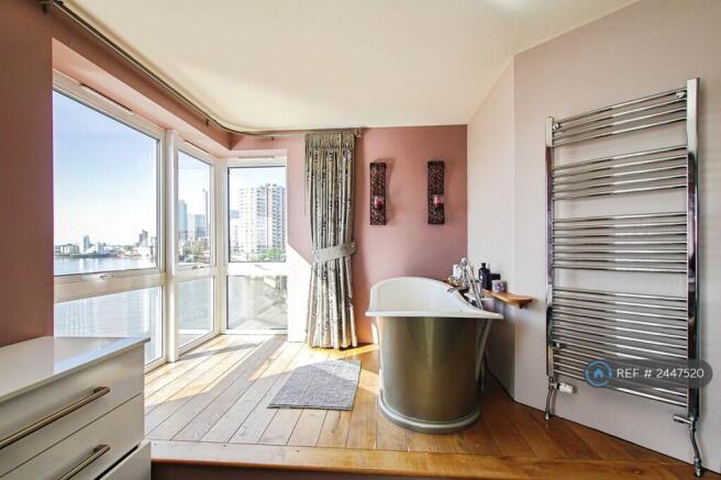 Bathtub In Main Bedroom