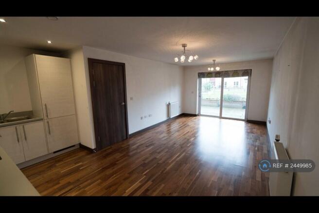 Large Lounge, Dining Area With Access To Patio.