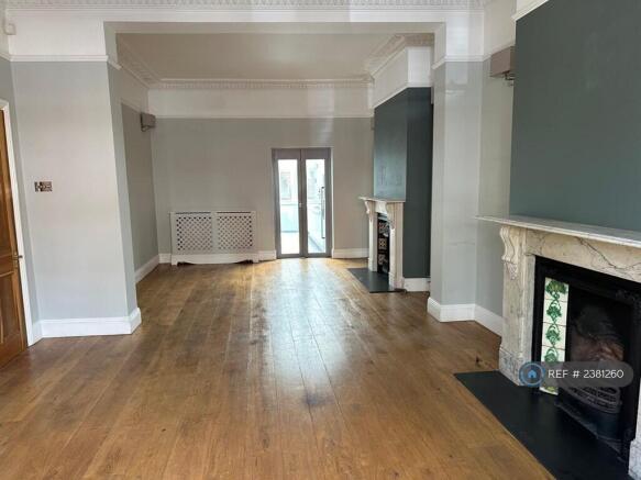Double Reception With Door To Kitchen