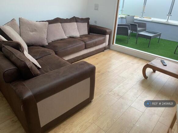 The Living Area Overlooking The Roof Terrace