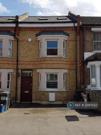 House- Front View With Car Spaces