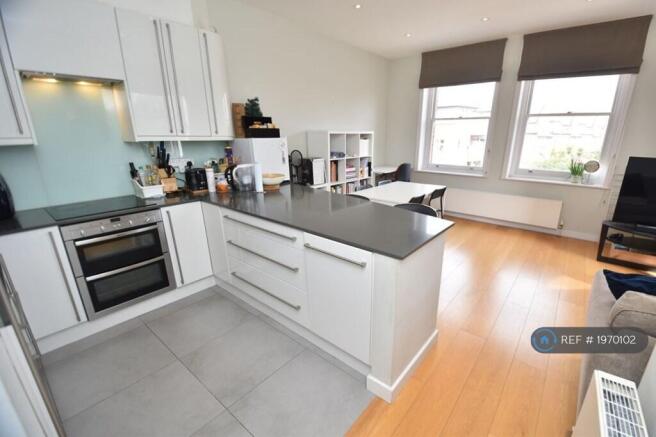 Kitchen, Breakfast Bar And Dining Area