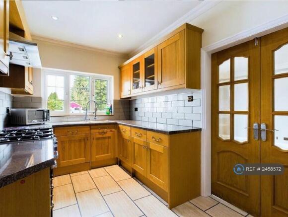 Amtico Flooring Throughout Kitchen.