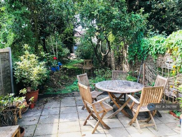Patio And Large Garden Beyond