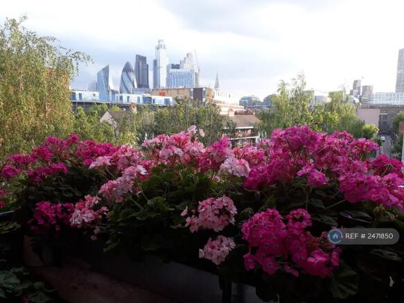 City Skyline From The Balcony