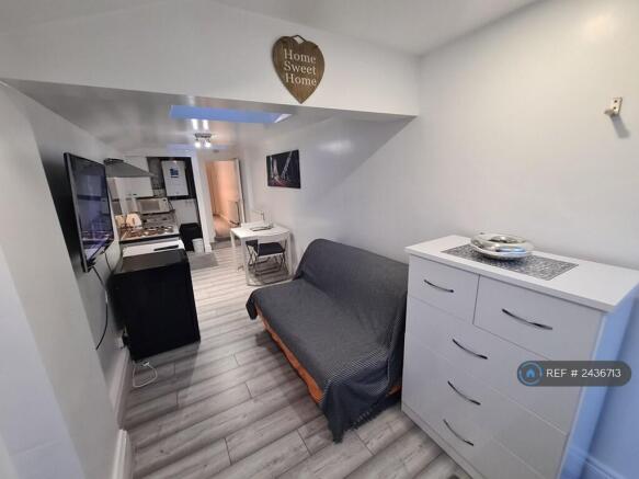 Lounge With Wall-Mounted 40inch Tv, Sofabed, Chest