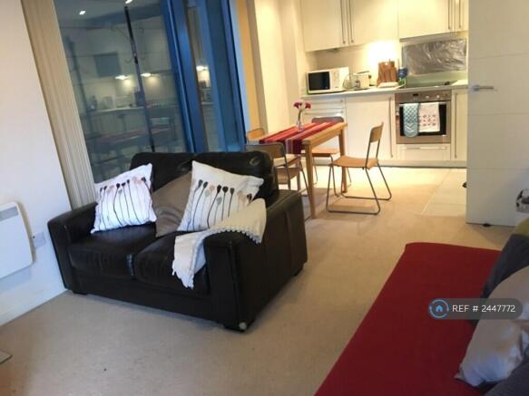 Living Room With Open Plan Dining Kitchen