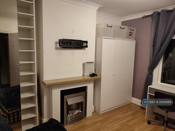 Three Door Wardrobe And Generous Folding Cupboard