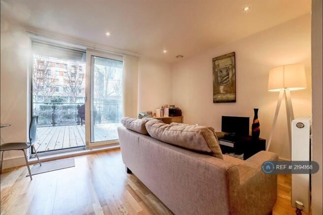 Living Space Looking Out To Private Balcony