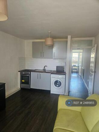 Living Room And Open Plan Kitchenette