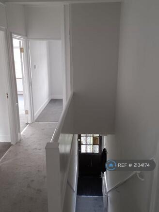 Front Stairway Up To Hallway