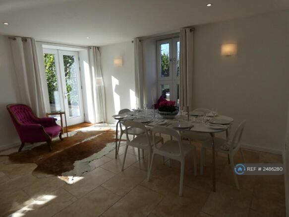 Dining Room With Patio Doors To Side Patio Area
