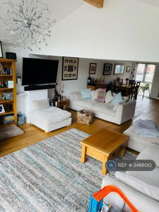 Living Area With Wall Mounted Tv