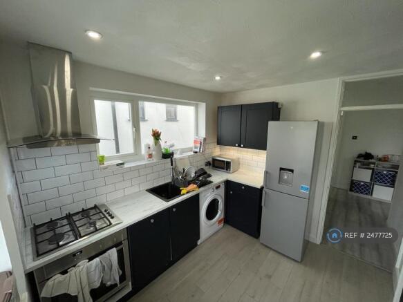 Modern Kitchen With White Goods Included 