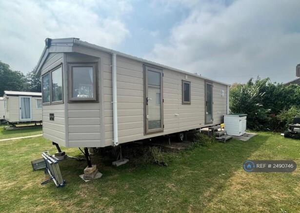 Exterior (Trim And Steps Being Installed)