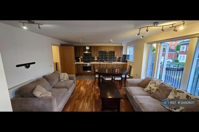 Living Room Facing Kitchen & Dining