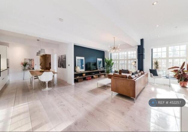 Scandinavian Hardwood Spanning The Whole Apartment
