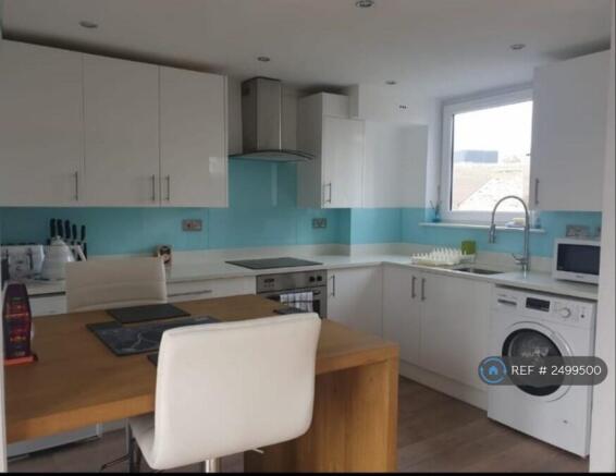 Kitchen With Dining Table