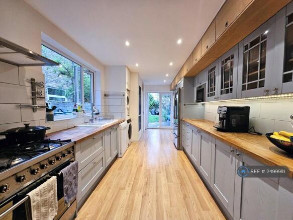 Large, Modern Kitchen Opening Onto Private Garden