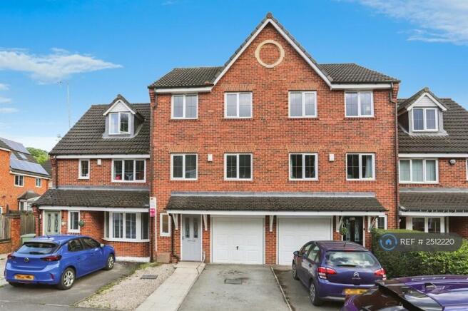 Front Of Property With Parking & Garage