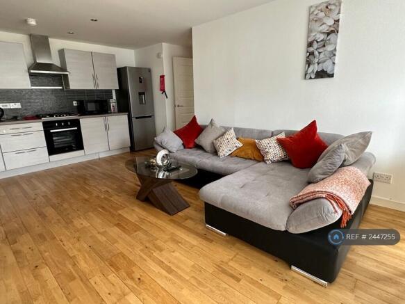 Sitting Area With Part Of The Kitchen