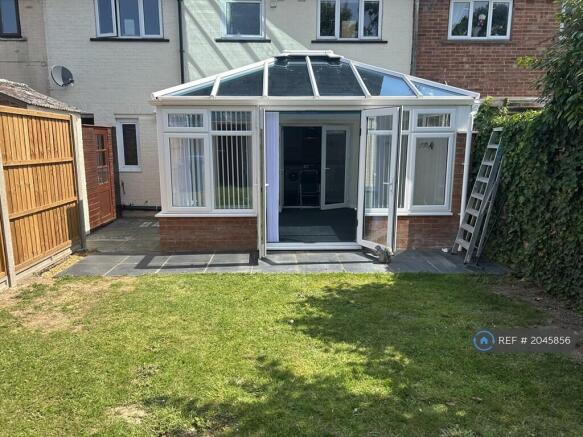 Rear Garden And Conservatory