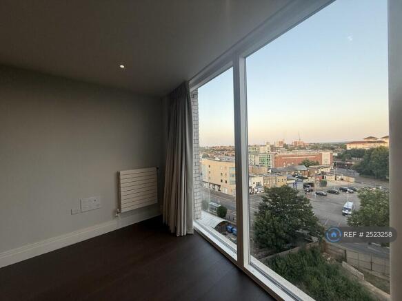 Floor To Ceiling Window With a View