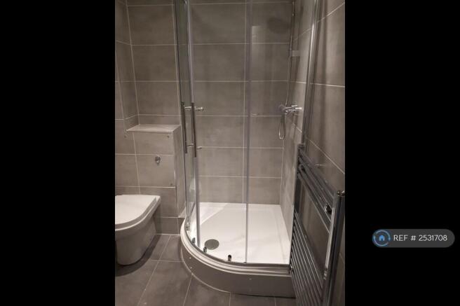 Porcelain Tiled Shower And Vanity Unit