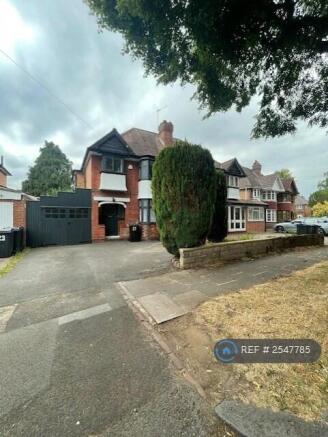 Front View Of The House And Drive