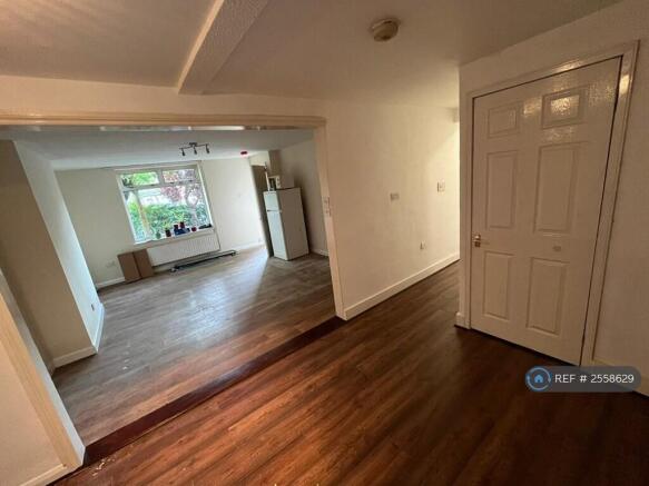 Living Room And Passage To Bedrooms