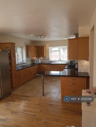 Large Oak And Granite Kitchen