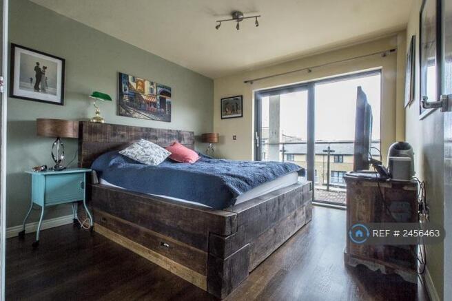 Bedroom With Balcony Over Canal