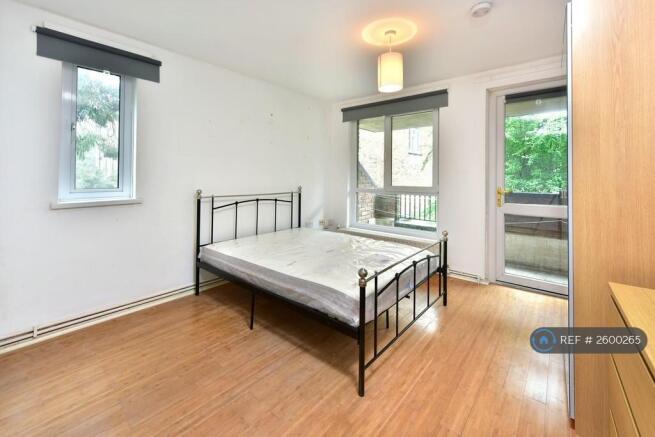 Bedroom With Balcony