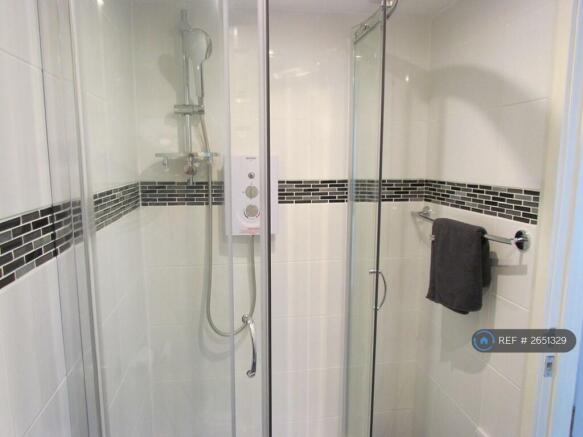 Electric Shower With Glass Cubical
