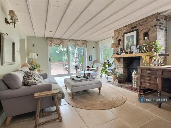 The Reception Room With a Fireplace