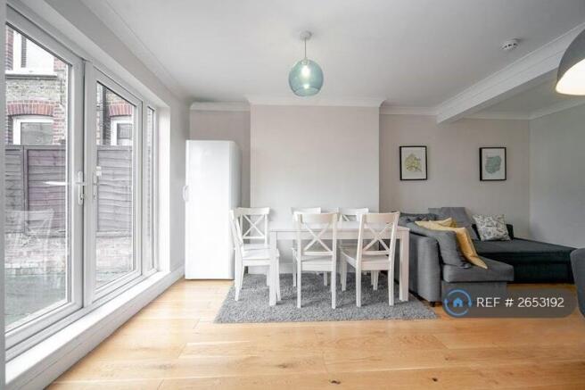 Brightly Lit Living And Dining Area