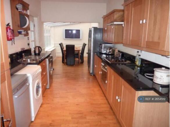 Huge Breakfast Kitchen With 55" Smart