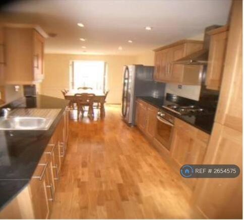 Huge Breakfast Kitchen With 55" Smart