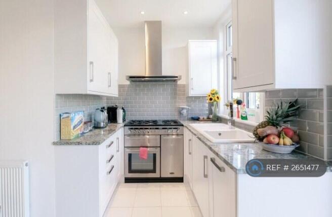 Kitchen With Granite And High End Appliances
