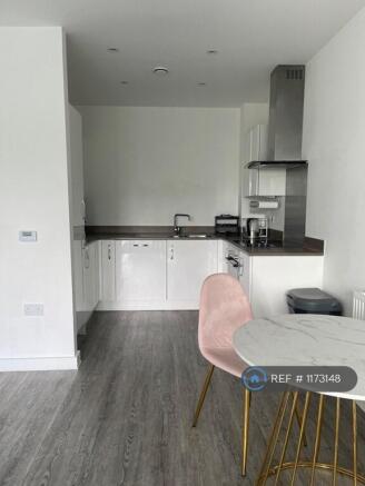 Kitchen Area Including Dishwasher