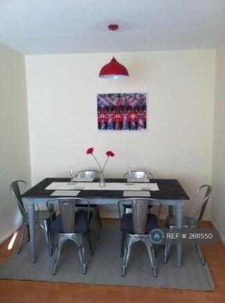 Dining Area With Stylish Table And Chairs