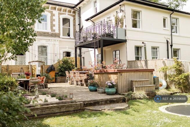 View Of Outside Kitchen From Garden.