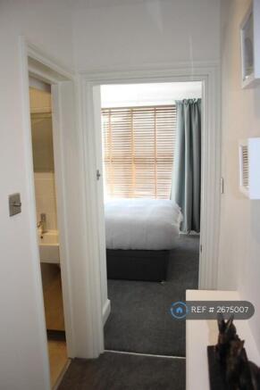 Hallway Looking Into Front Bedroom